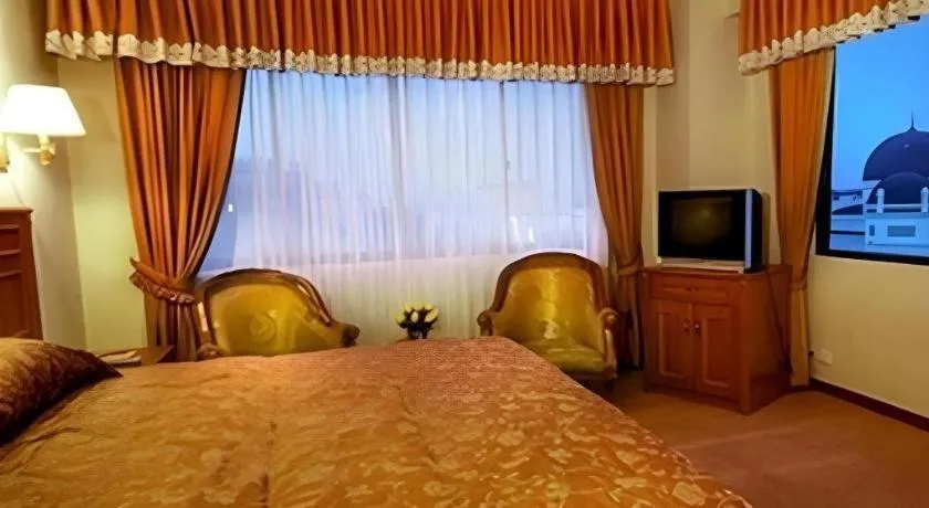 Bed in Madani Hotel Medan