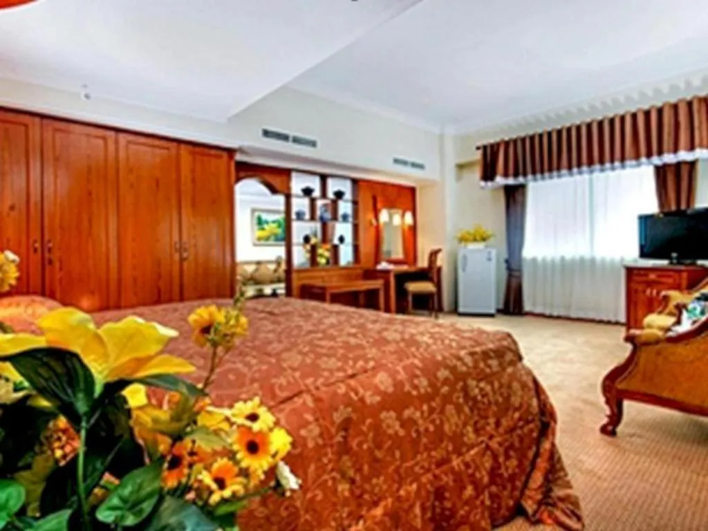 Bed in Madani Hotel Medan