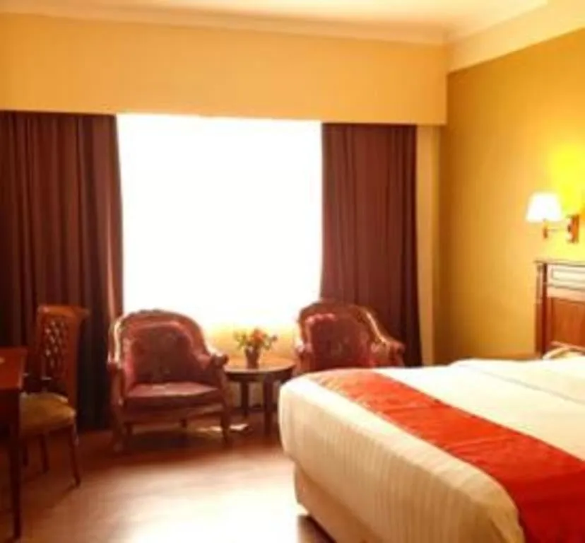 Bed in Madani Hotel Medan