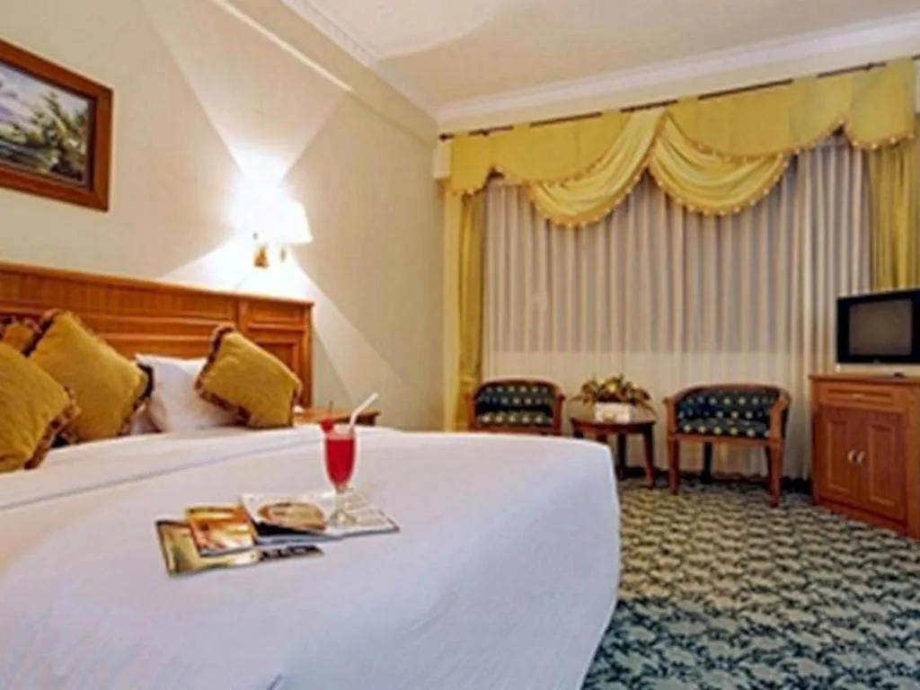 Bed in Madani Hotel Medan