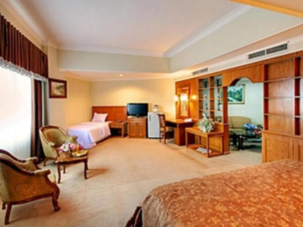 Bed in Madani Hotel Medan