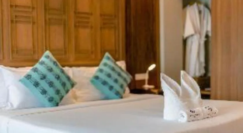 Bed in Bonito Chinos Hotel