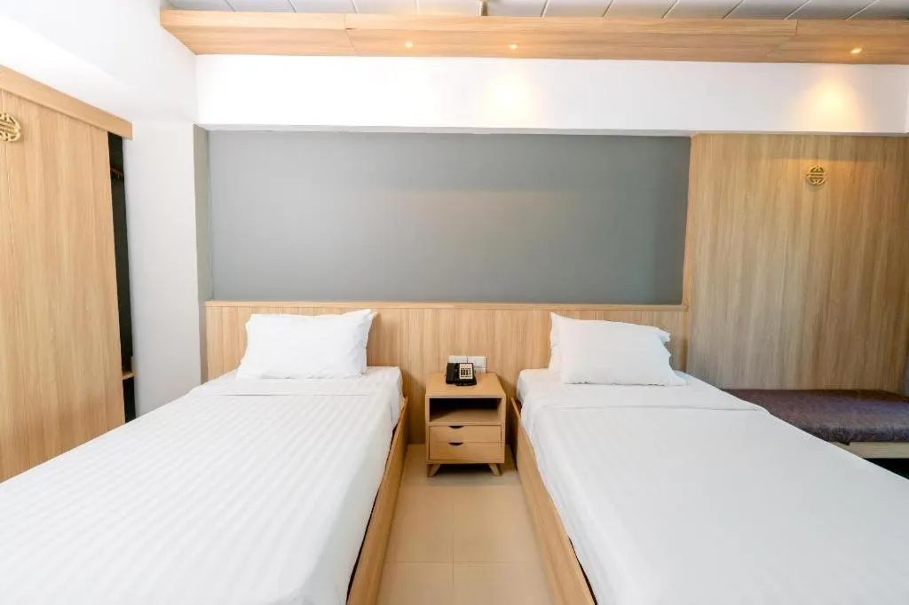 Bed in Bonito Chinos Hotel