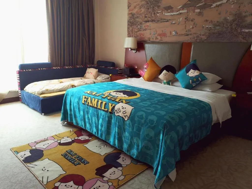 Bed in New Century Grand Hotel Ninghai Jinhai