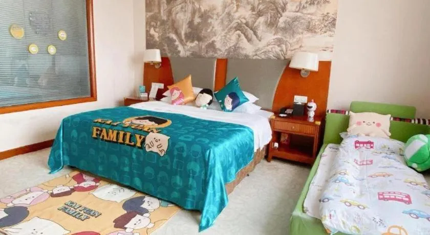 Bed in New Century Grand Hotel Ninghai Jinhai