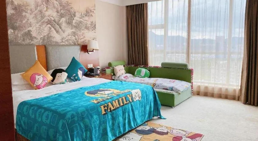 Bed in New Century Grand Hotel Ninghai Jinhai