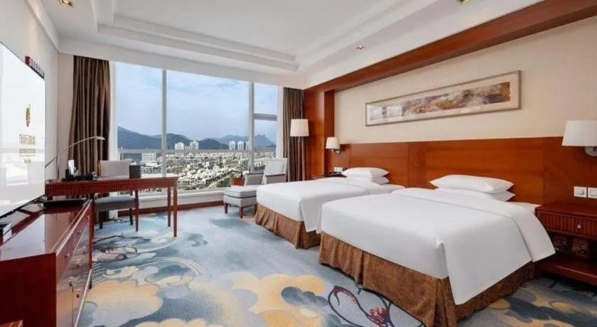 Bed in New Century Grand Hotel Ninghai Jinhai