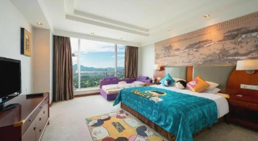 Bed in New Century Grand Hotel Ninghai Jinhai