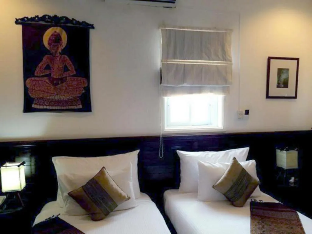 Bed in Residence Sisouk Boutique Hotel