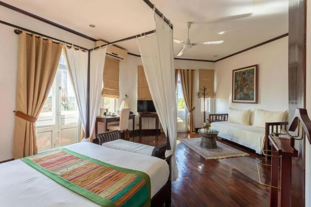 Bed in Residence Sisouk Boutique Hotel