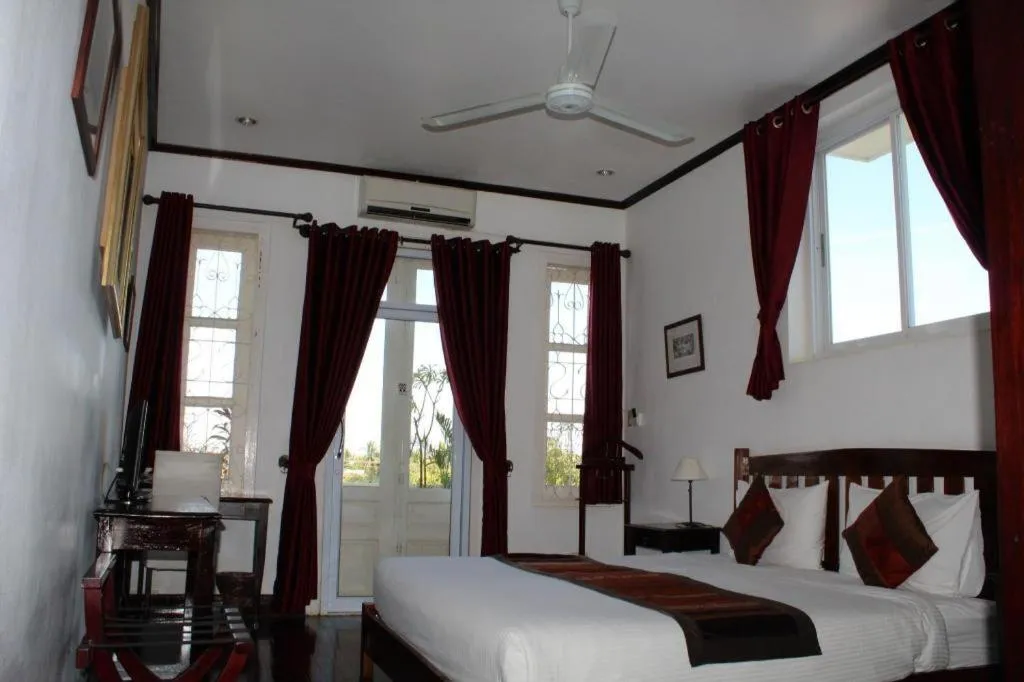 Bed in Residence Sisouk Boutique Hotel