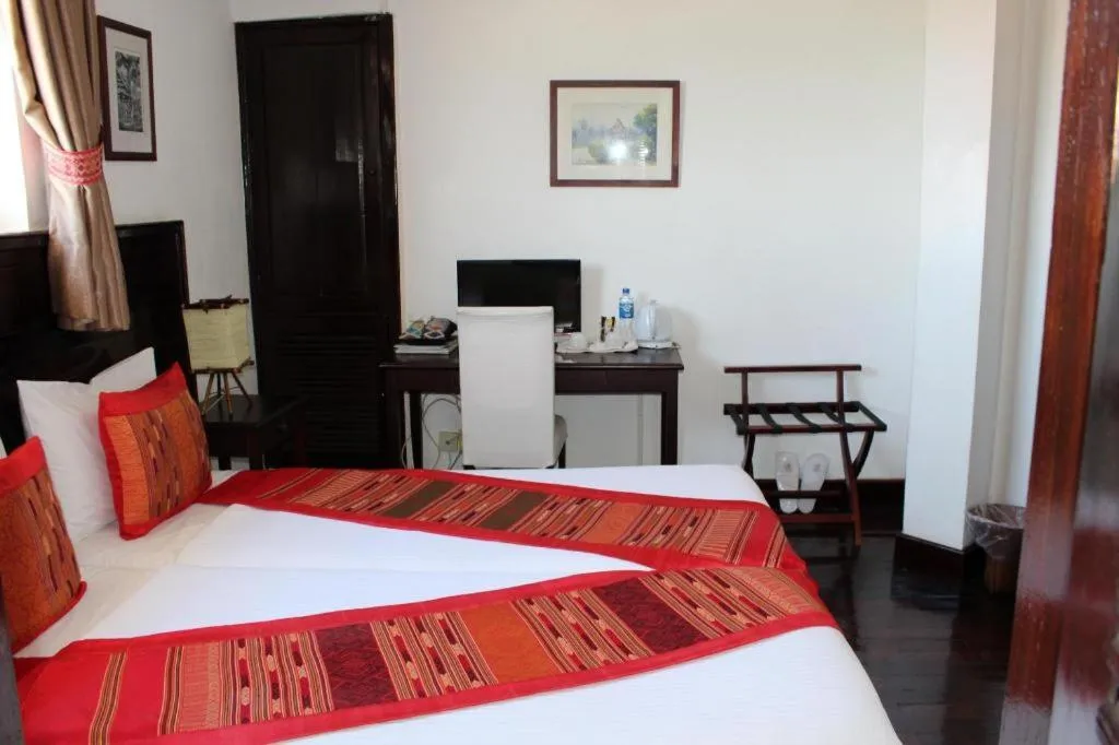 Bed in Residence Sisouk Boutique Hotel