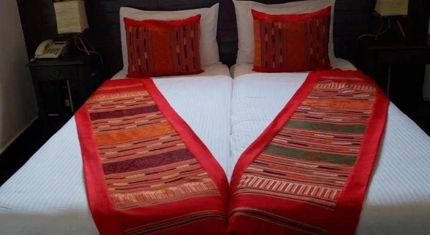 Bed in Residence Sisouk Boutique Hotel