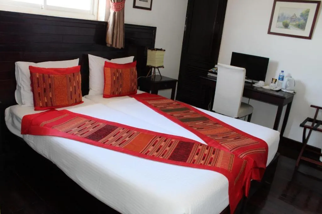 Bed in Residence Sisouk Boutique Hotel