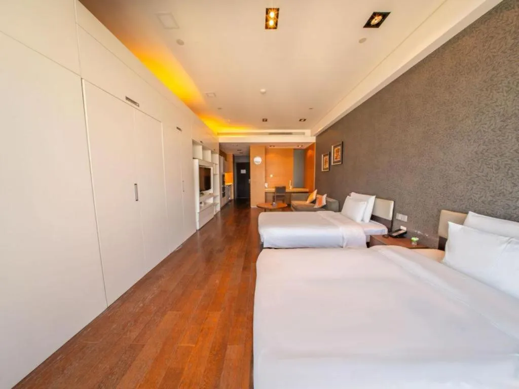 Bed in Grand Madison Qingdao Harbour-view Central（Former Qingdao Farglory Hotel）