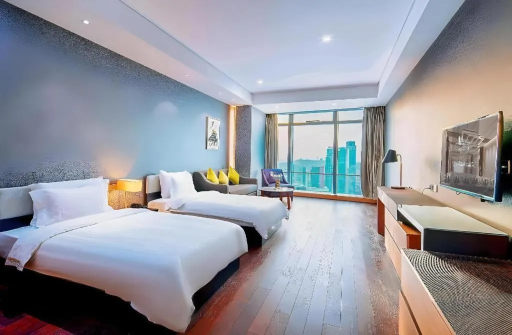 Bed in Grand Madison Qingdao Harbour-view Central（Former Qingdao Farglory Hotel）