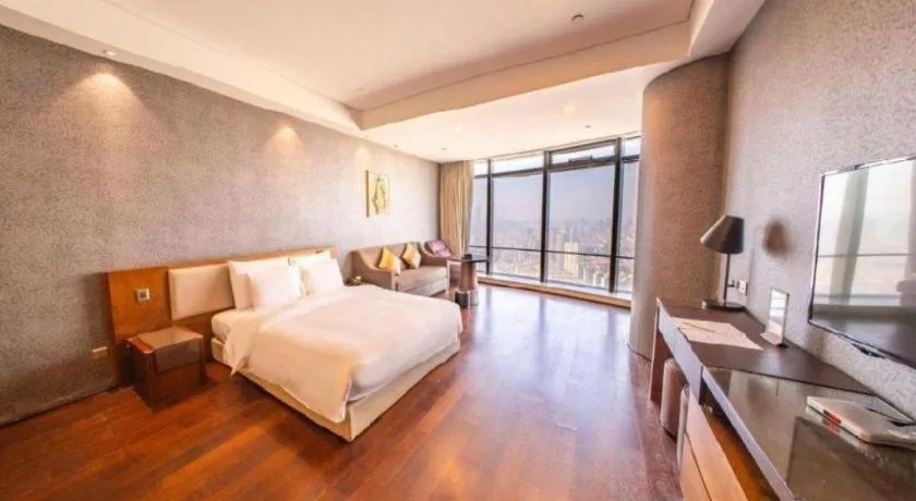 Bed in Grand Madison Qingdao Harbour-view Central（Former Qingdao Farglory Hotel）
