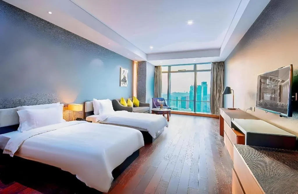Bed in Grand Madison Qingdao Harbour-view Central（Former Qingdao Farglory Hotel）