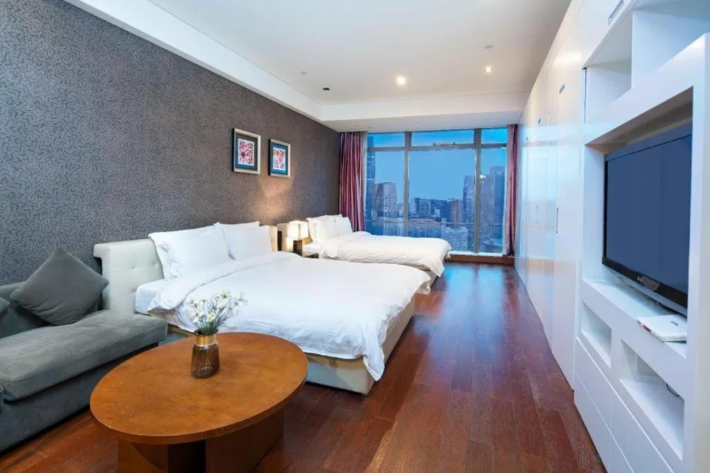 Bed in Grand Madison Qingdao Harbour-view Central（Former Qingdao Farglory Hotel）