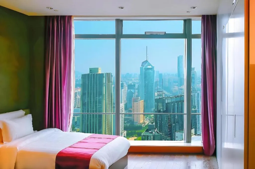 Bed in Grand Madison Qingdao Harbour-view Central（Former Qingdao Farglory Hotel）