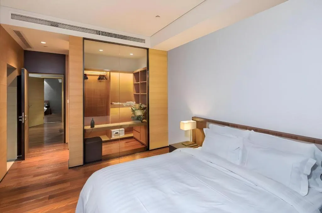 Bed in Grand Madison Qingdao Harbour-view Central（Former Qingdao Farglory Hotel）