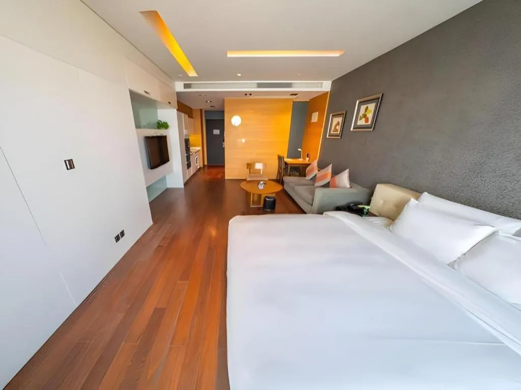 Bed in Grand Madison Qingdao Harbour-view Central（Former Qingdao Farglory Hotel）