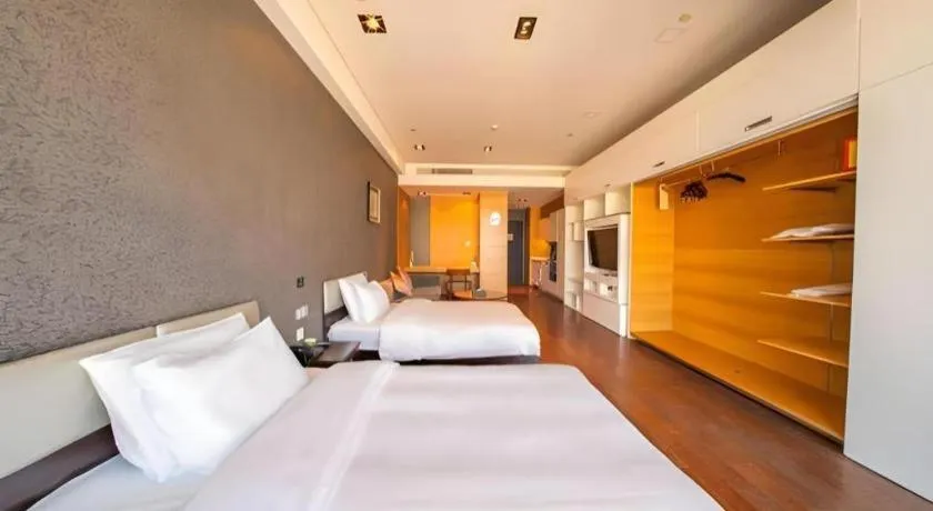 Bed in Grand Madison Qingdao Harbour-view Central（Former Qingdao Farglory Hotel）