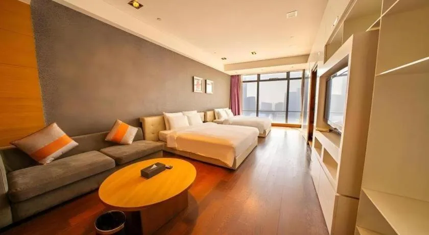 Bed in Grand Madison Qingdao Harbour-view Central（Former Qingdao Farglory Hotel）