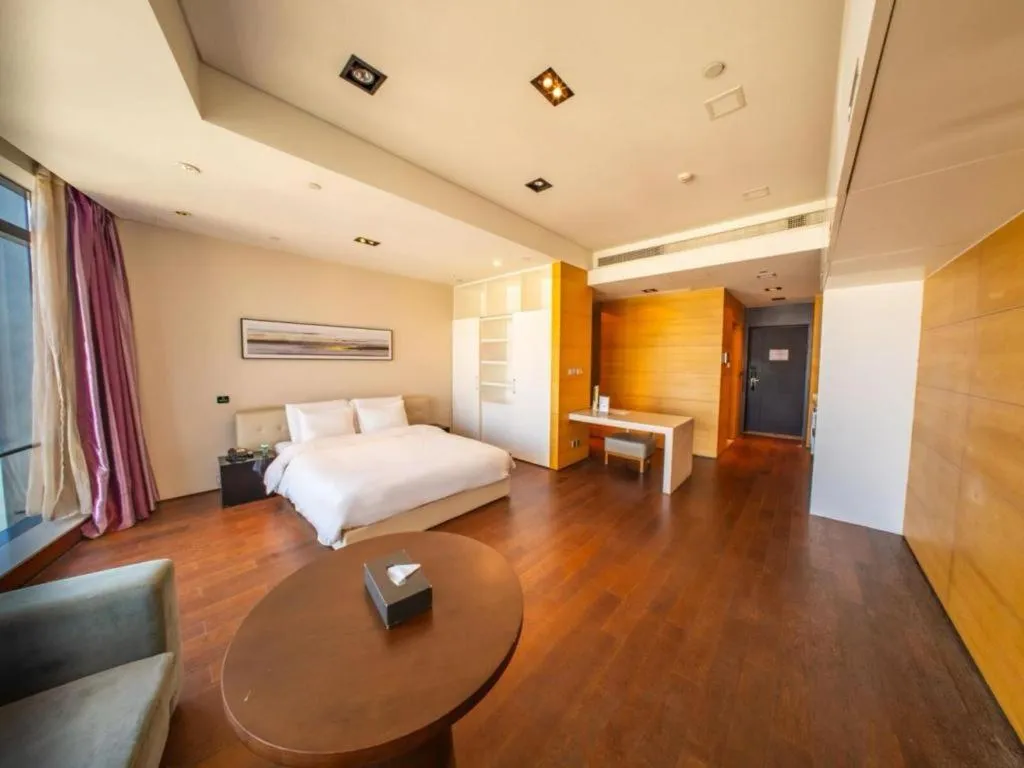 Bed in Grand Madison Qingdao Harbour-view Central（Former Qingdao Farglory Hotel）