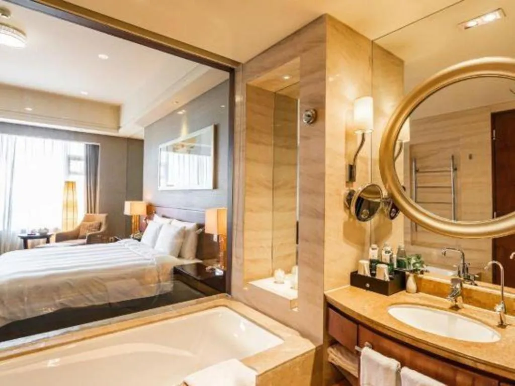 Bed in Quanzhou Guest House Hotel