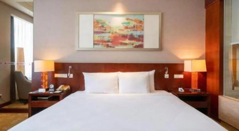 Bed in Quanzhou Guest House Hotel