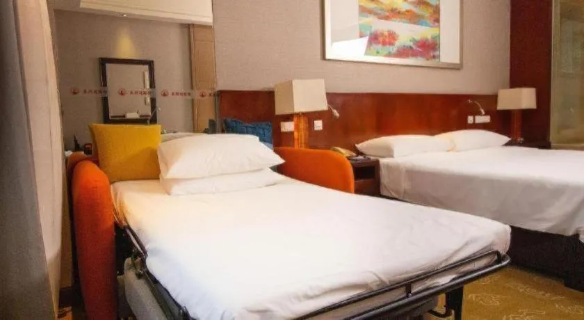 Bed in Quanzhou Guest House Hotel