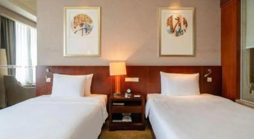 Bed in Quanzhou Guest House Hotel