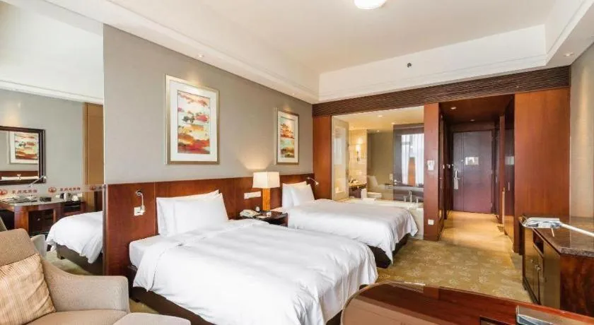 Bed in Quanzhou Guest House Hotel