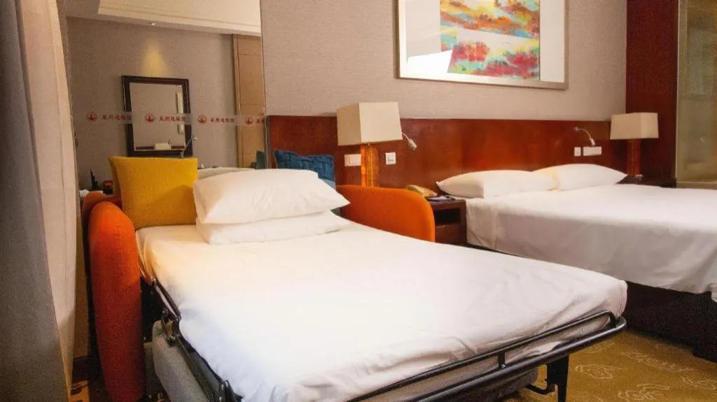 Bed in Quanzhou Guest House Hotel