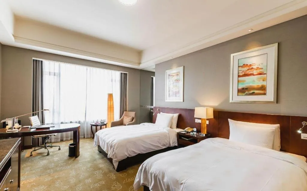 Bed in Quanzhou Guest House Hotel