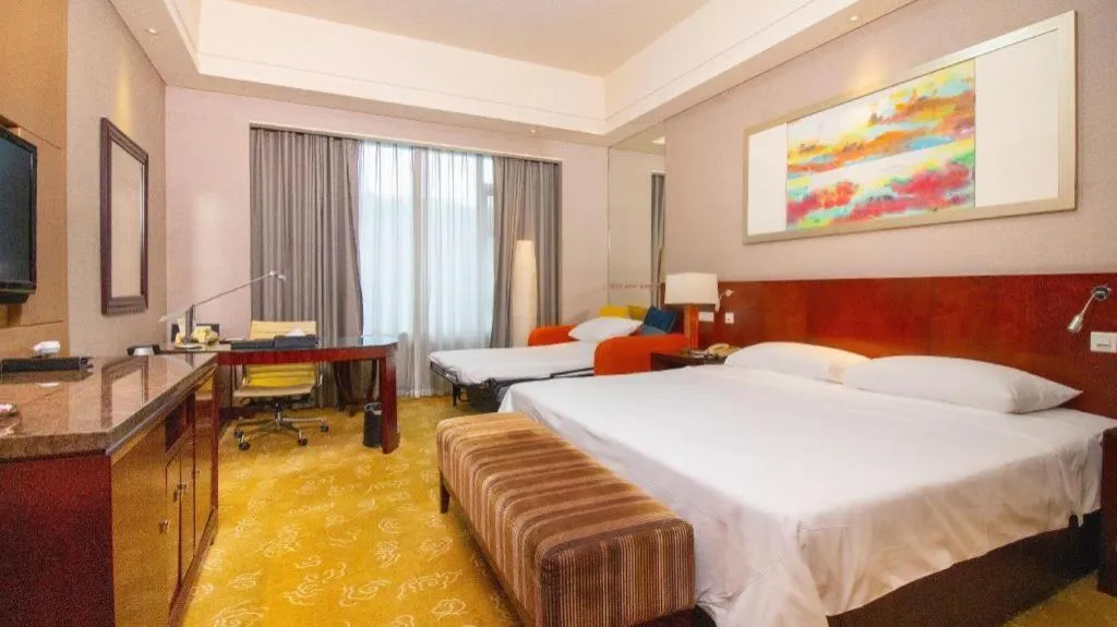 Bed in Quanzhou Guest House Hotel