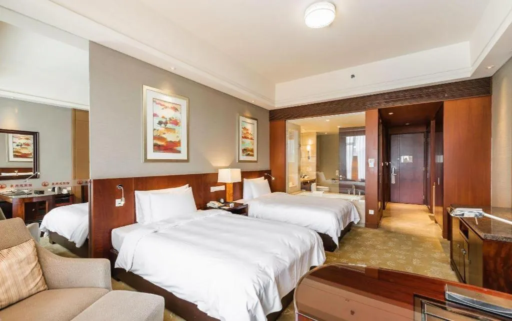 Bed in Quanzhou Guest House Hotel