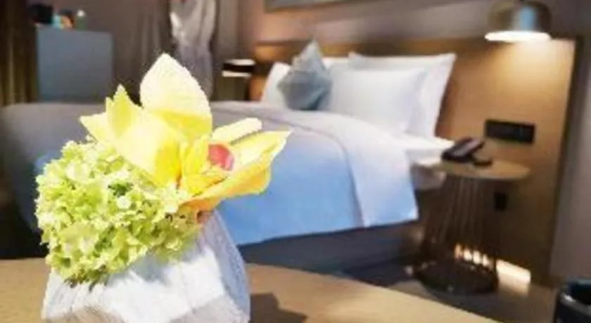 Bed in Kecheng Holiday Hotel