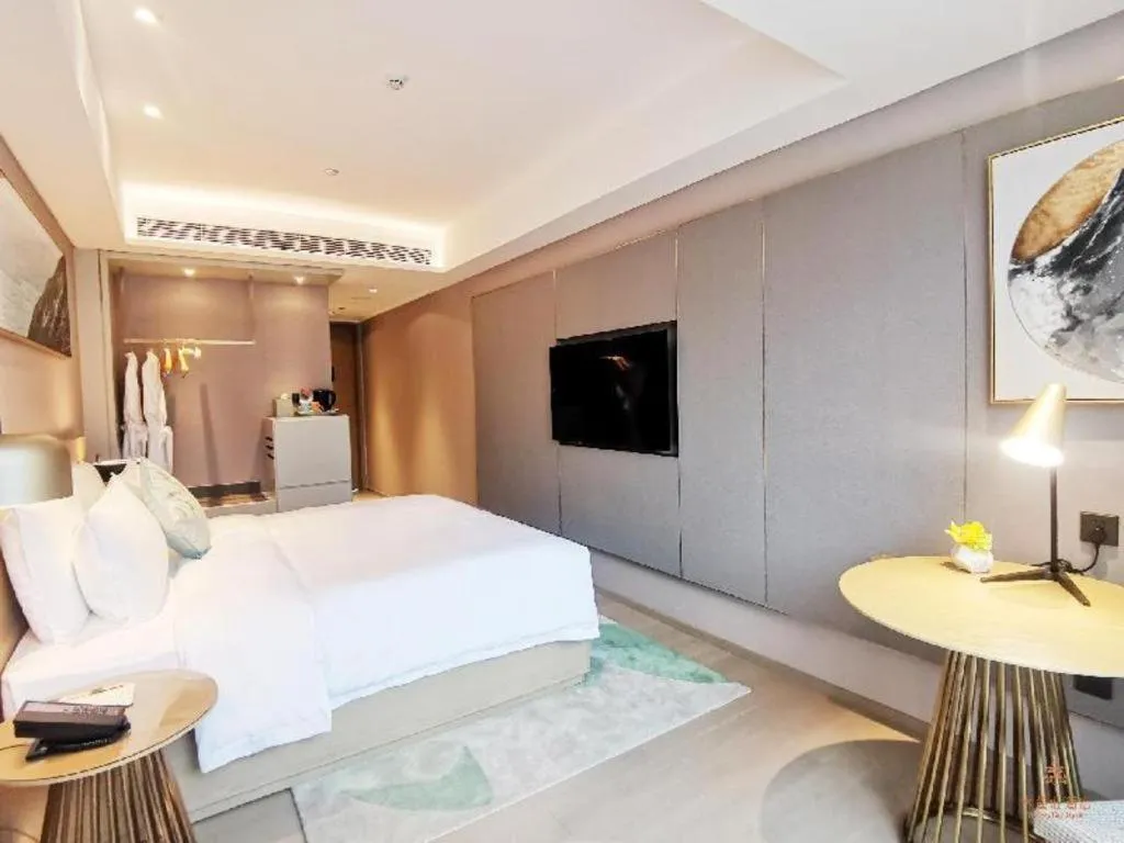 Bed in Kecheng Holiday Hotel