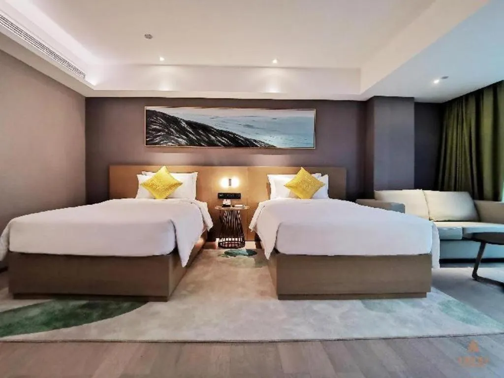 Bed in Kecheng Holiday Hotel
