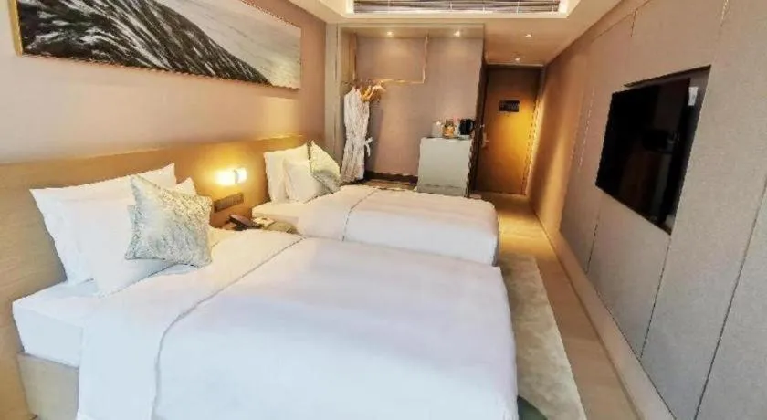 Bed in Kecheng Holiday Hotel