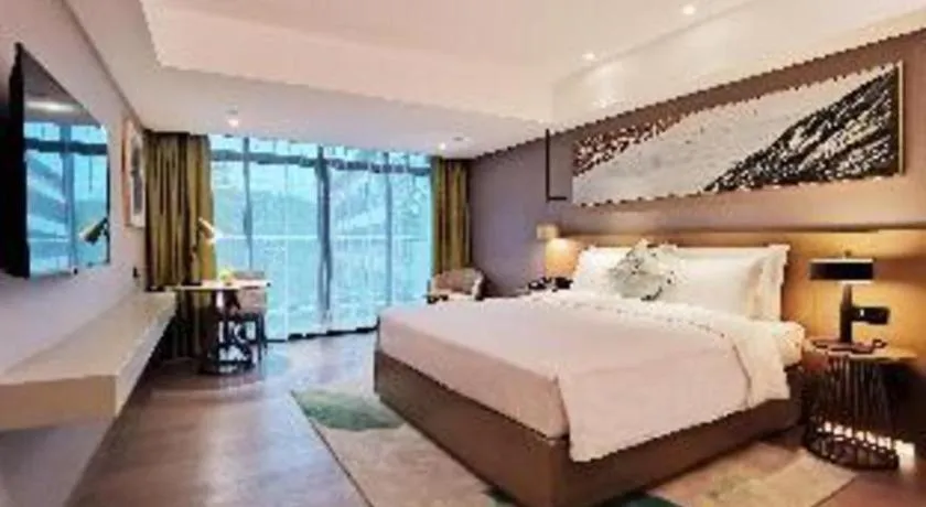 Bed in Kecheng Holiday Hotel