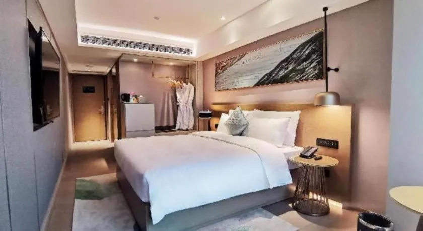 Bed in Kecheng Holiday Hotel