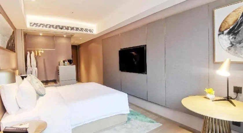 Bed in Kecheng Holiday Hotel