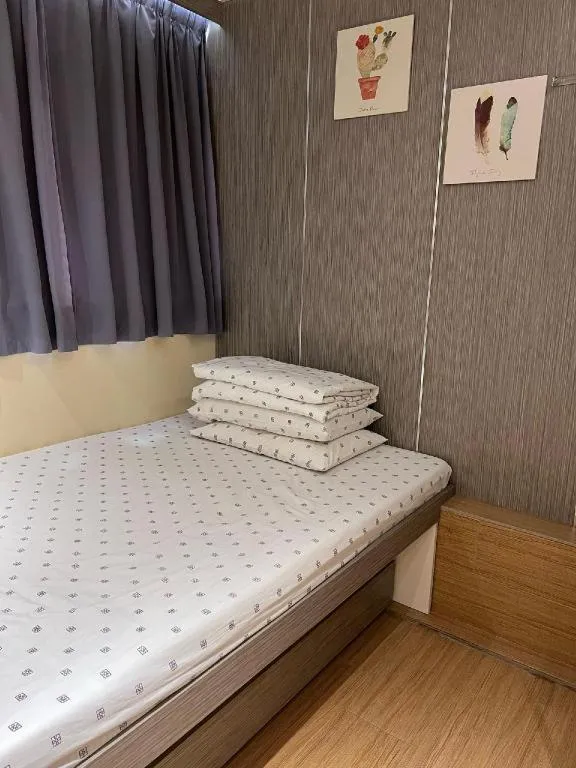 Bed in New Mong Kok Guest House