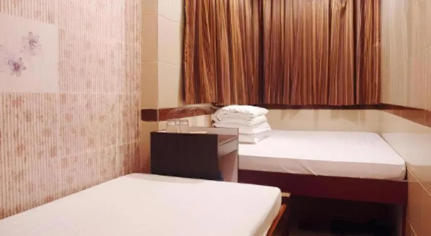 Bed in New Mong Kok Guest House