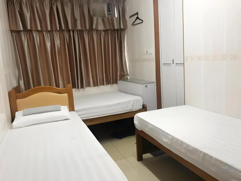 Bed in New Mong Kok Guest House