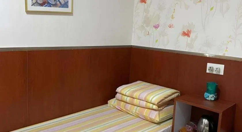 Bed in New Mong Kok Guest House