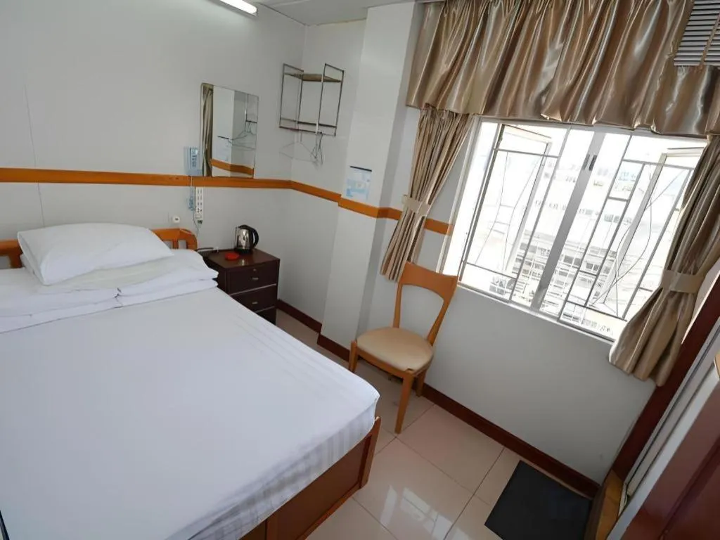 Bed in New Mong Kok Guest House